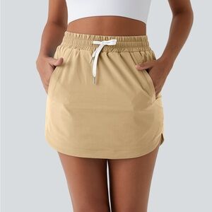 Halara Golf Tan Curved Hem Mini Skirt with Drawstring
